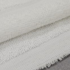 Bijeli pamučni frotir - mekan i upijajući, idealan za ručnike i ogrtače