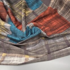 Moderna karirana tkanina u smeđim tonovima s akcentima u boji (140 g/m²) 1 m / 5,50 €